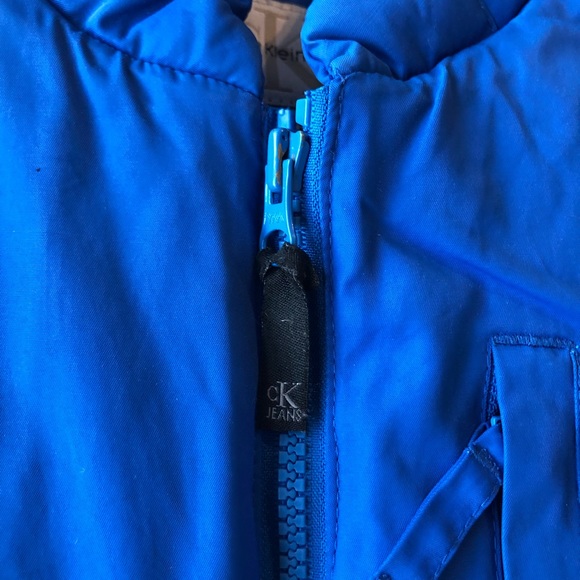 (200) Calvin Klein Blue Puffer Vest - Picture 5 of 8